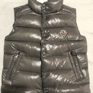 Moncler Vest boy or girl can wear it. Never been used Runs small